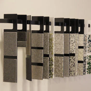 Mosaic tile sample racks in a range of colors and finishes